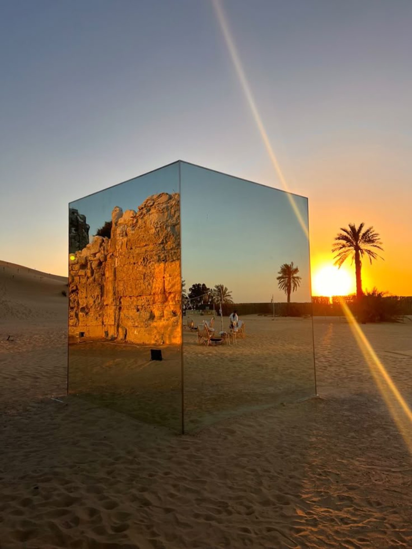 Mirrored cube in the desert